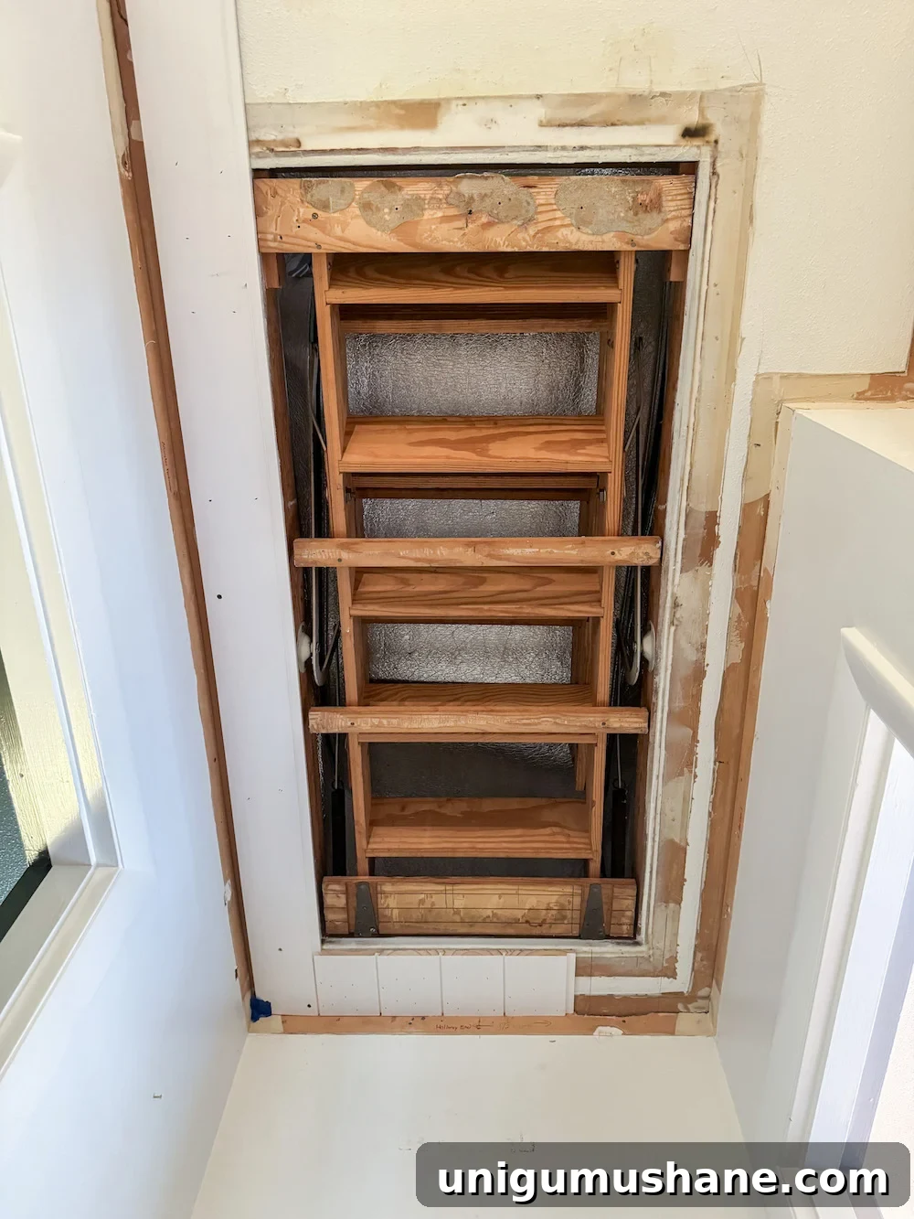 Hide Your Attic Door with a Tongue and Groove Ceiling 8 hide attic door with shiplap planks