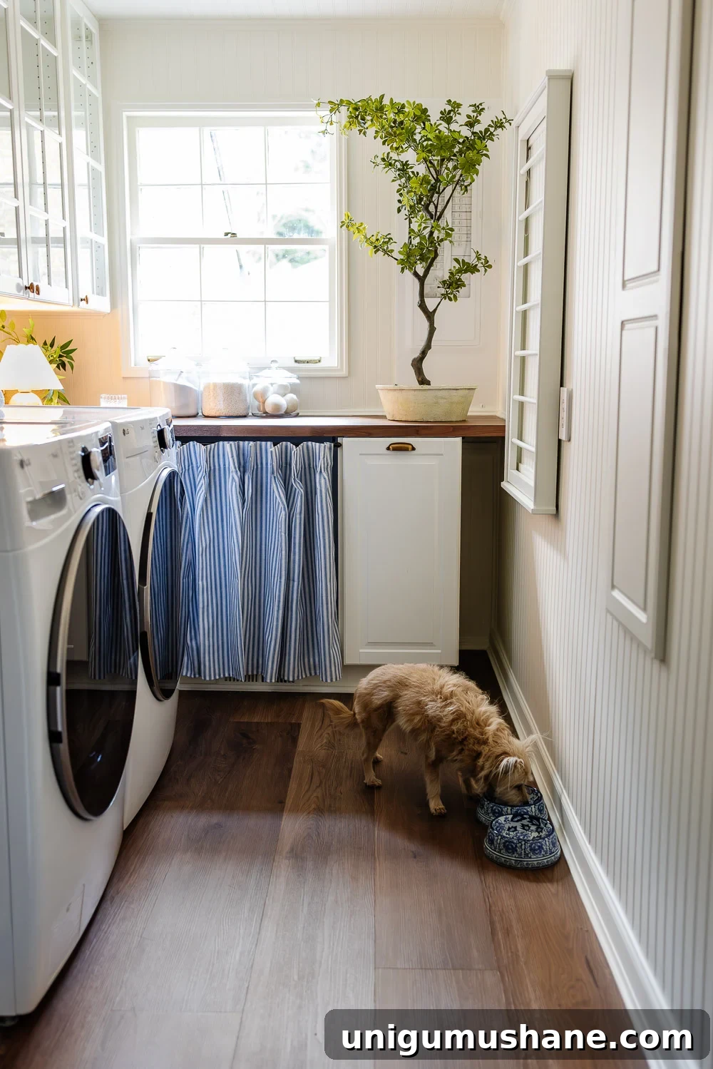 narrow laundry room layout with IKEA cabinets with vintage Nancy Meyers style