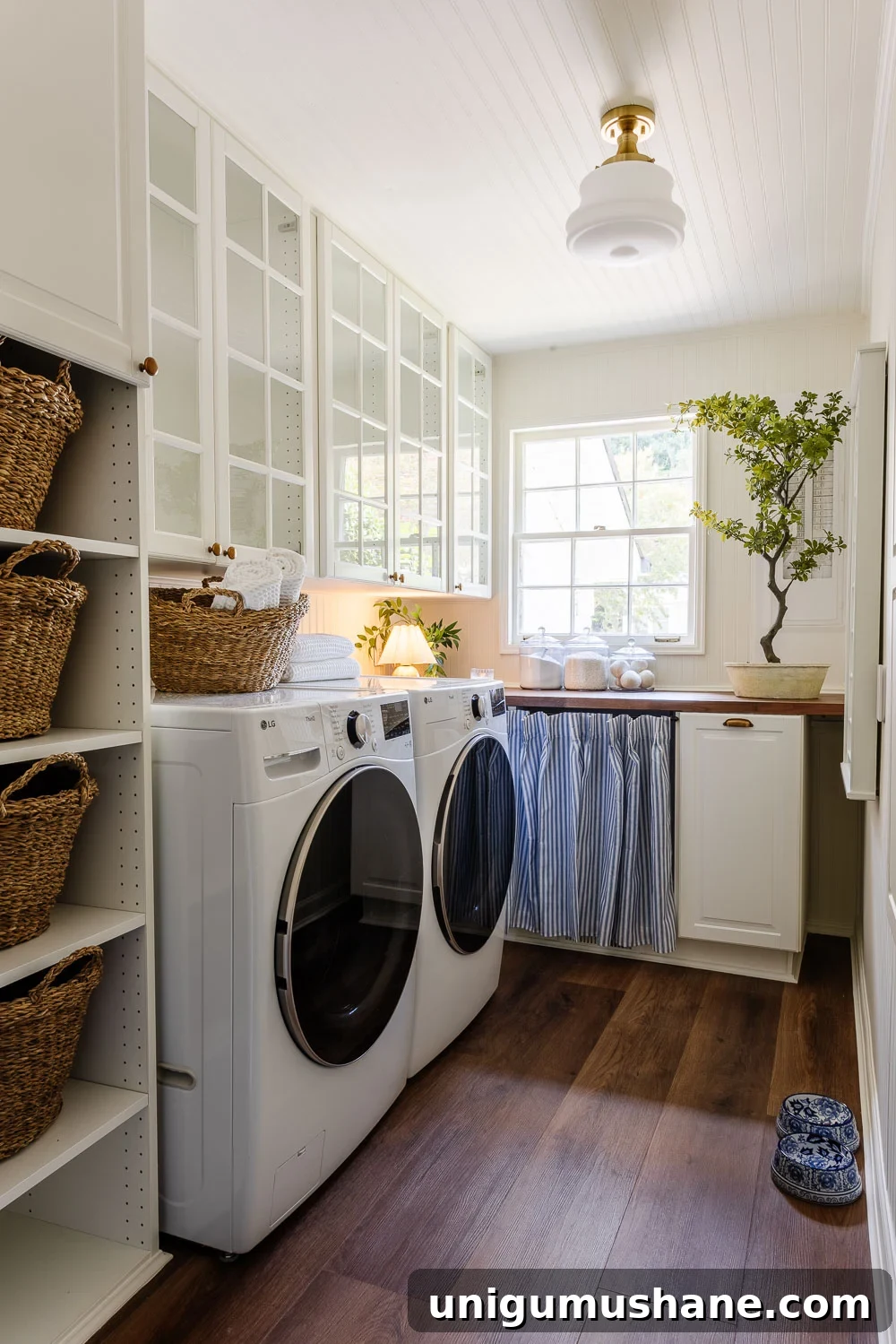 Narrow Laundry Room Layout That Maximizes Storage and Efficiency 5 narrow laundry room layout with IKEA cabinets with vintage Nancy Meyers style