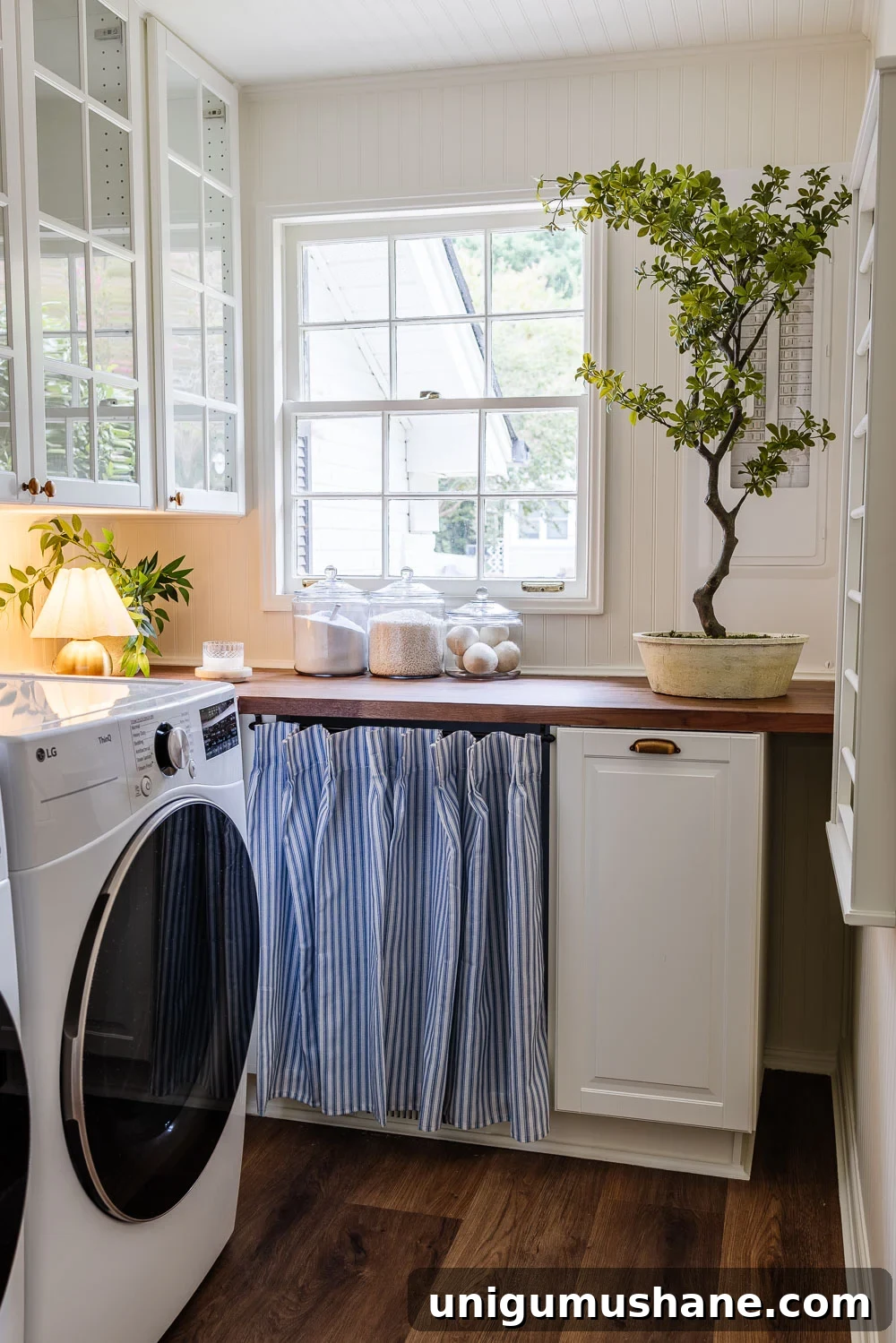 Narrow Laundry Room Layout That Maximizes Storage and Efficiency 7 narrow laundry room layout with IKEA cabinets with vintage Nancy Meyers style