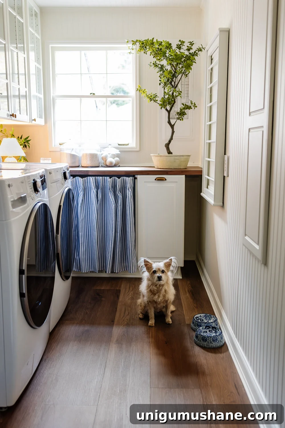Narrow Laundry Room Layout That Maximizes Storage and Efficiency 10 narrow laundry room layout with IKEA cabinets with vintage Nancy Meyers style