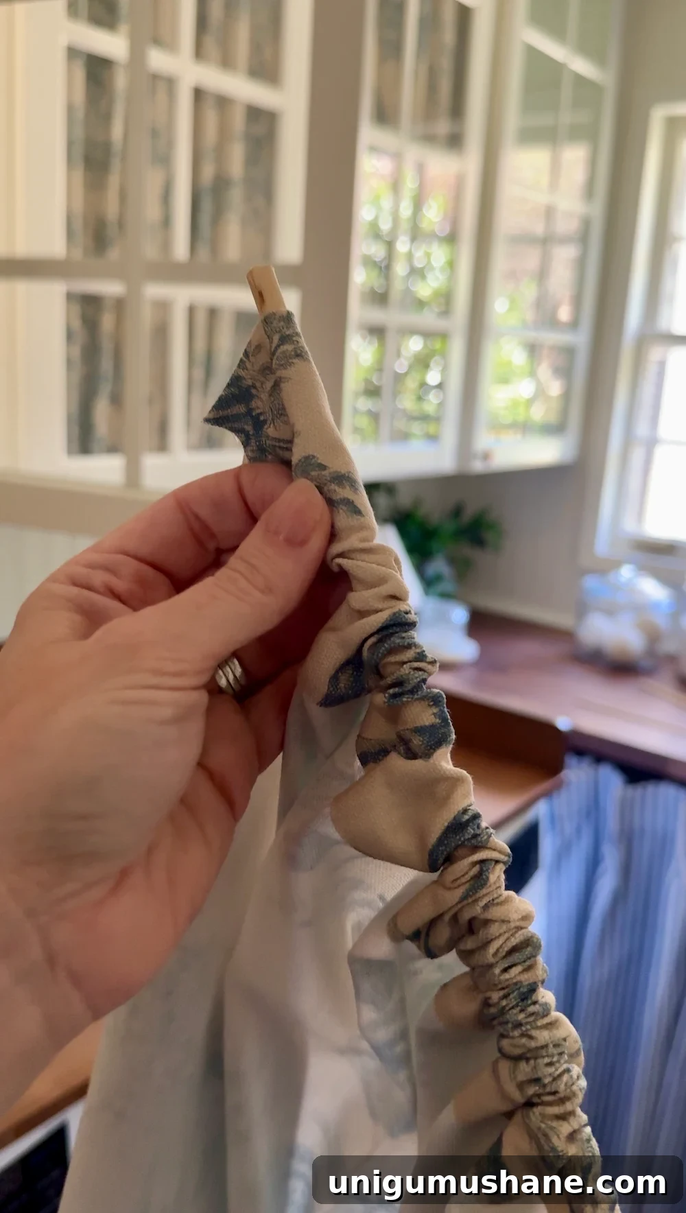 Transform Cabinets with No-Sew Fabric Doors That Hide Clutter 11 No Sew DIY Fabric Cabinet Doors That Hide Clutter in Style