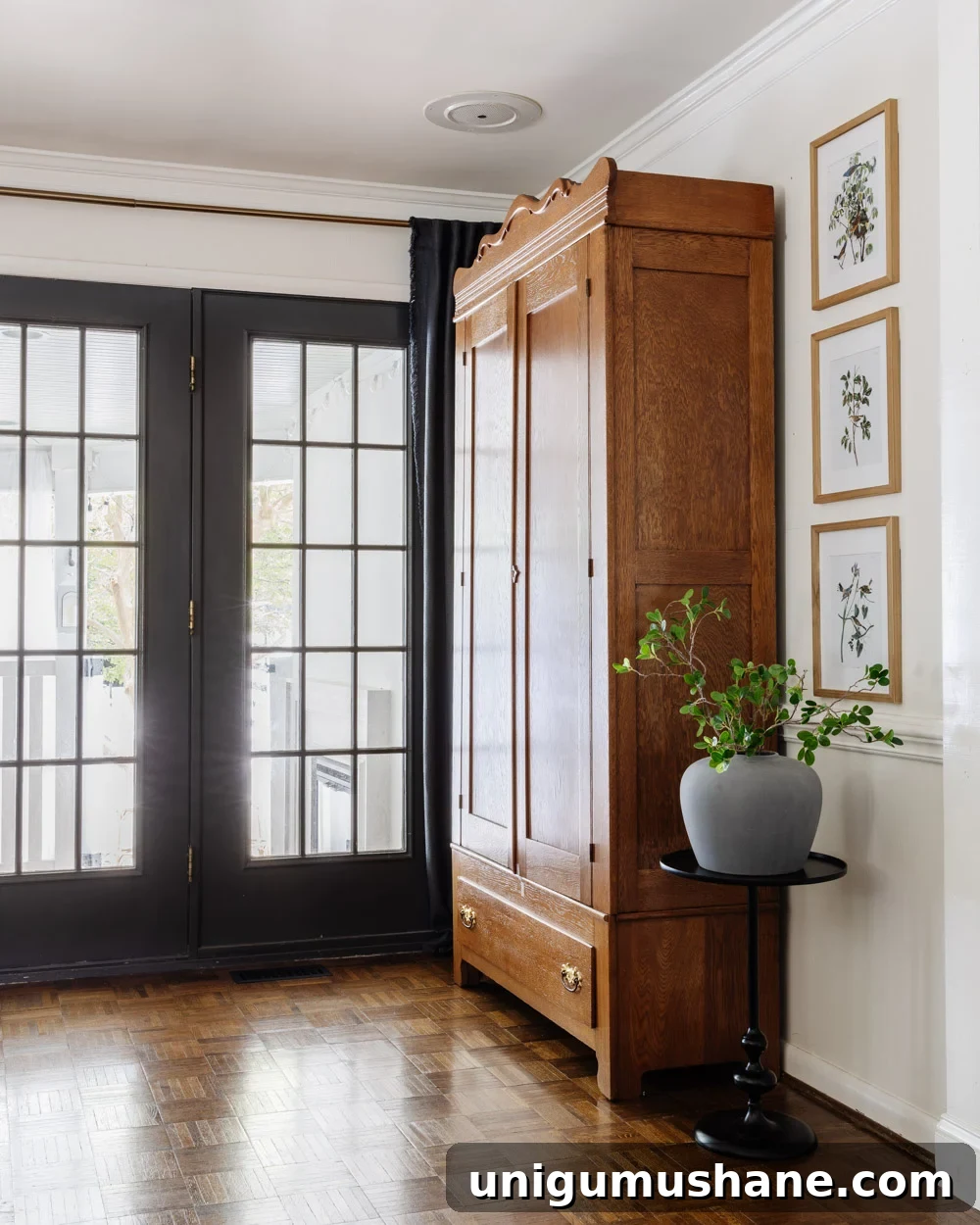 8 Years of Living Room Renovation and Design 9 armoire coat closet in an entryway for storage without a mudroom