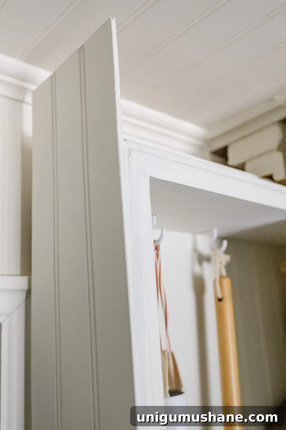 DIY Hidden Broom Closet That Disappears Into the Wall 10 hidden diy broom cupboard and cleaning supply storage in a laundry room