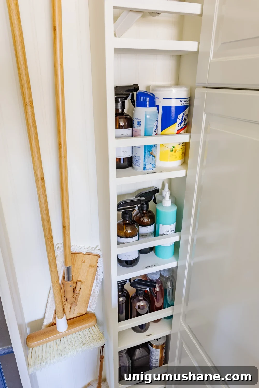 DIY Hidden Broom Closet That Disappears Into the Wall 4 hidden diy broom cupboard and cleaning supply storage in a laundry room