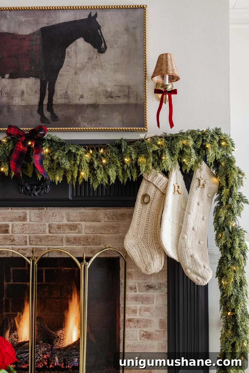 Our Christmas Home Tour: 12 Festive Decorating Tips 21 Ralph Lauren Christmas decorating ideas on a budget - navy blue mantel with garland