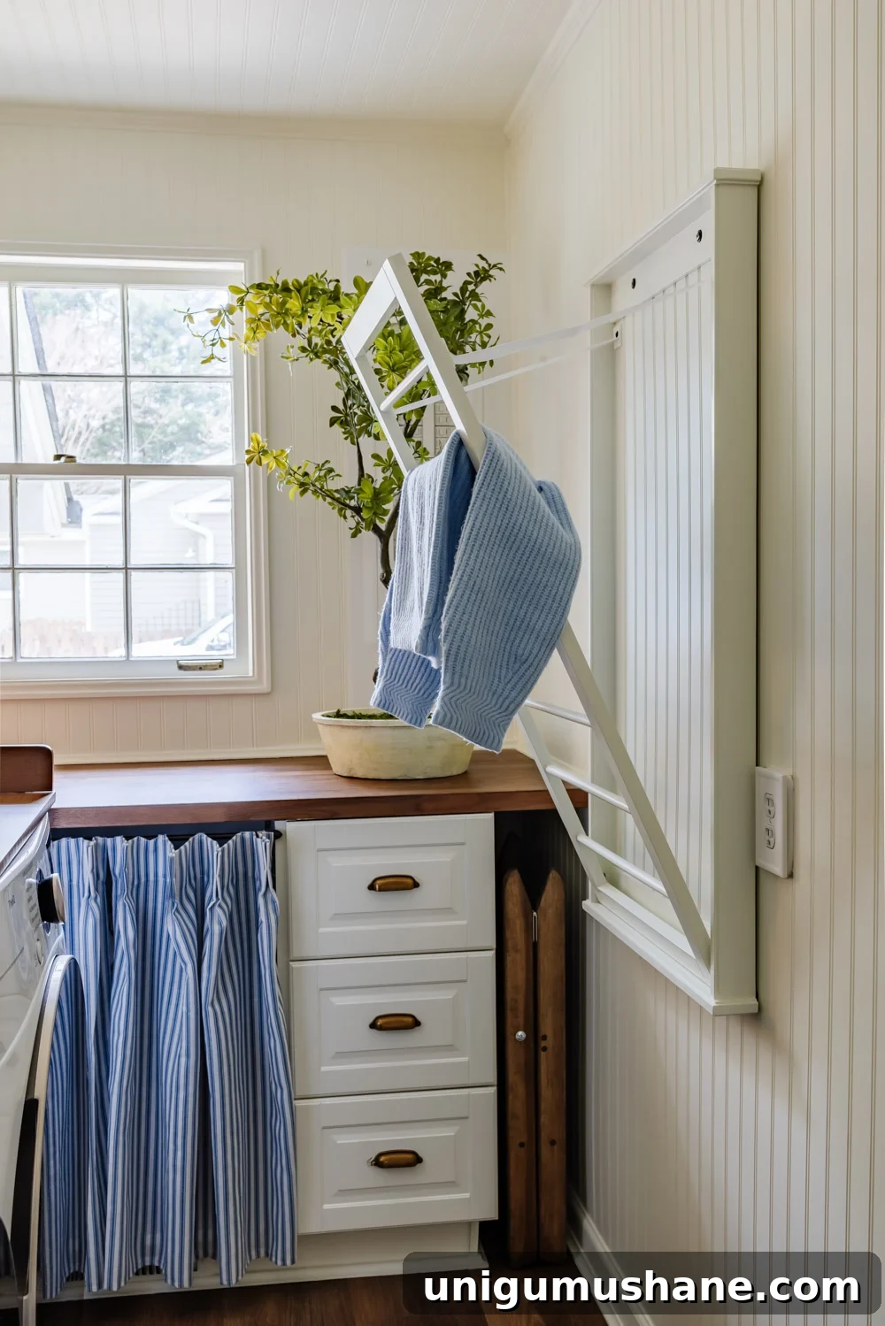 Maximize Storage in a Small Laundry Room 19 small laundry room organization - wall mounted drying rack