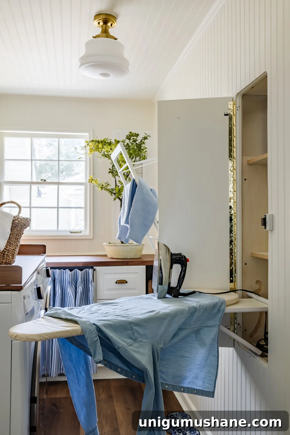 Maximize Storage in a Small Laundry Room 20 small laundry room organization - hidden ironing board