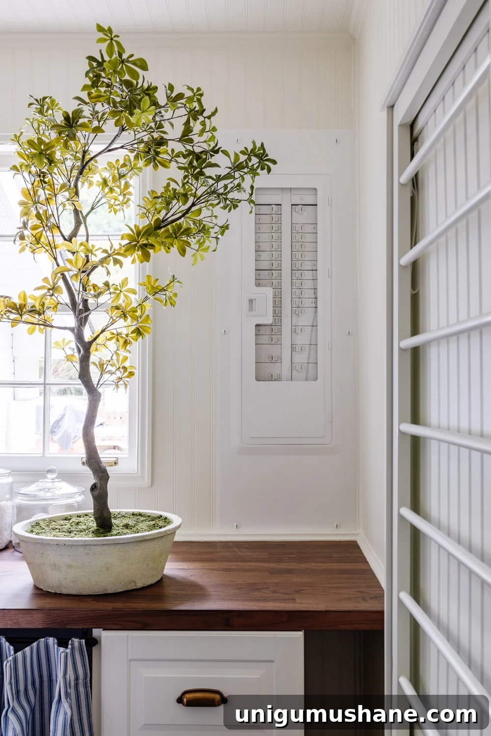 Maximize Storage in a Small Laundry Room 24 small laundry room organization - aesthetic electrical panel box
