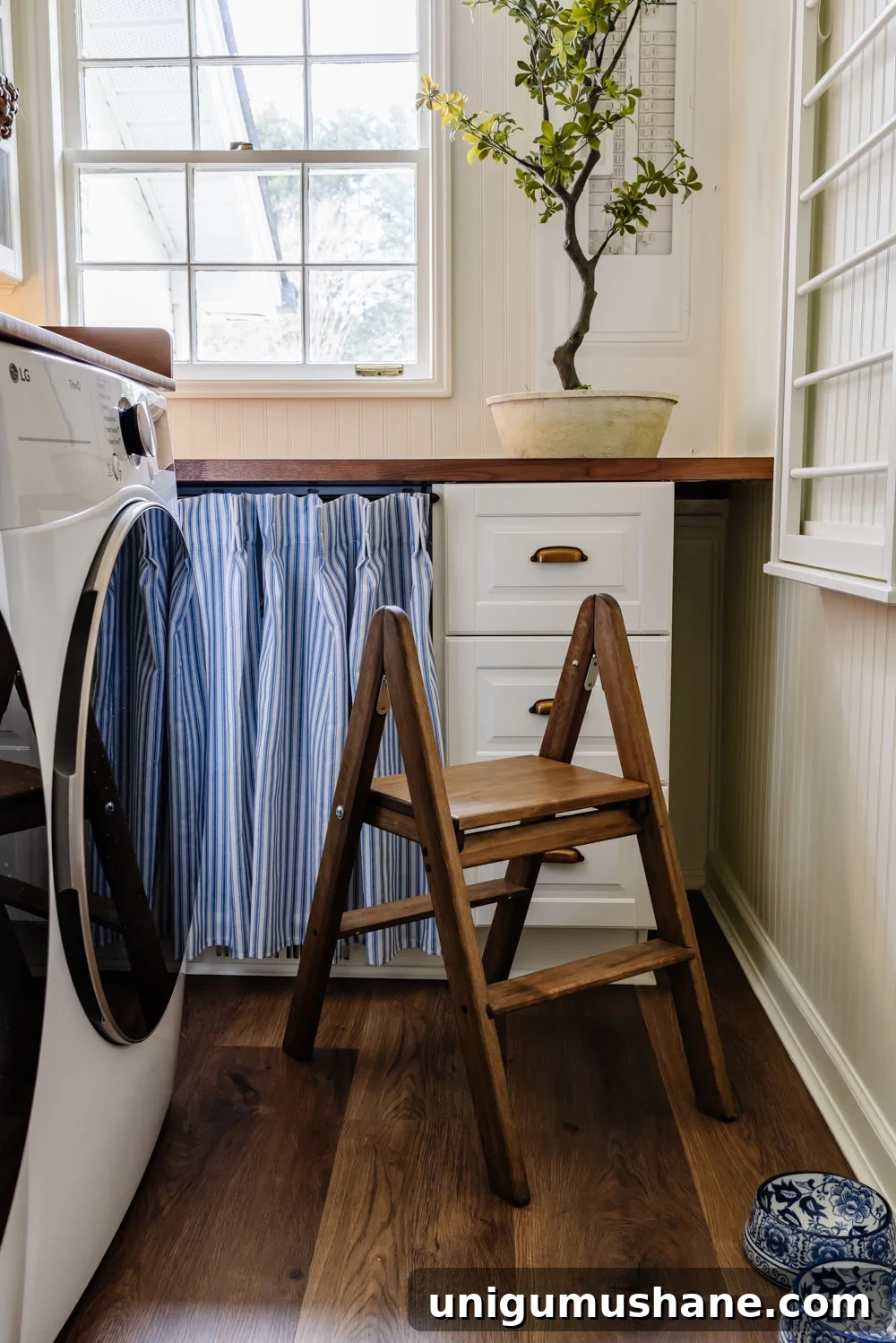 Maximize Storage in a Small Laundry Room 26 small laundry room organization - folding step stool
