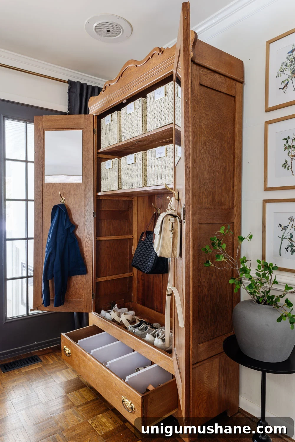 Aesthetic Storage Ideas That Work in Real Homes 6 armoire coat closet in an entryway for storage without a mudroom