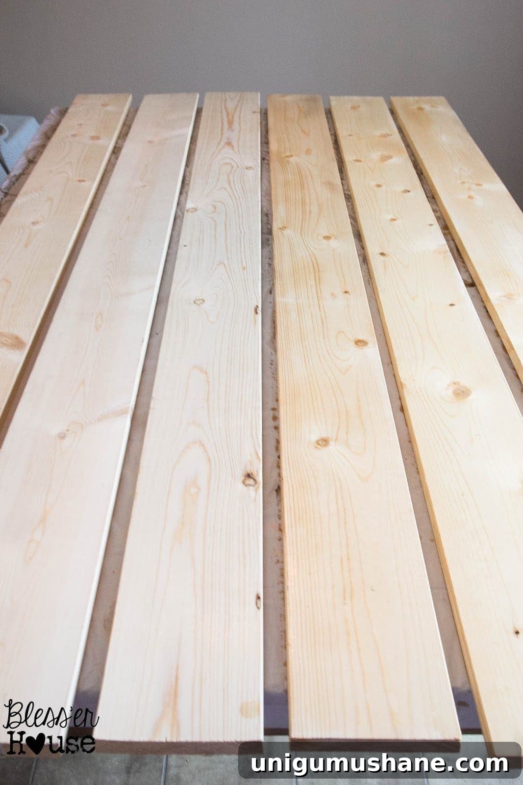 How to Stain Wood with Vinegar and Steel Wool 6 A side by side comparison of what regular lumber looks like compared to black tea stained lumber (on the left).
