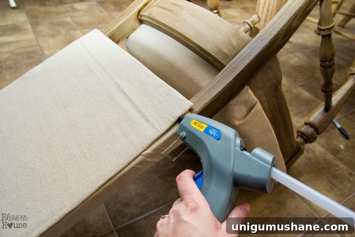 DIY No-Sew Knockoff Dining Chairs 11 Finished back panel glued into place