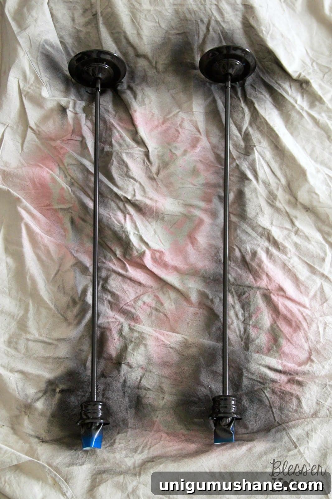 Painted pendant light rods ready for rope wrapping