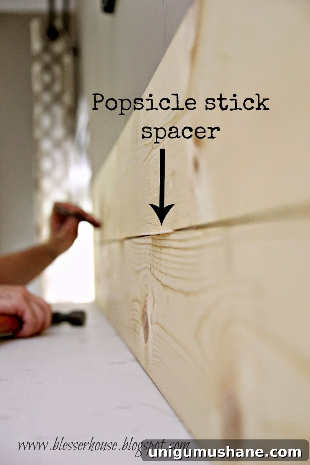 How to Build a Faux Fireplace Entertainment Center: Part 2 7 planks nearly installed