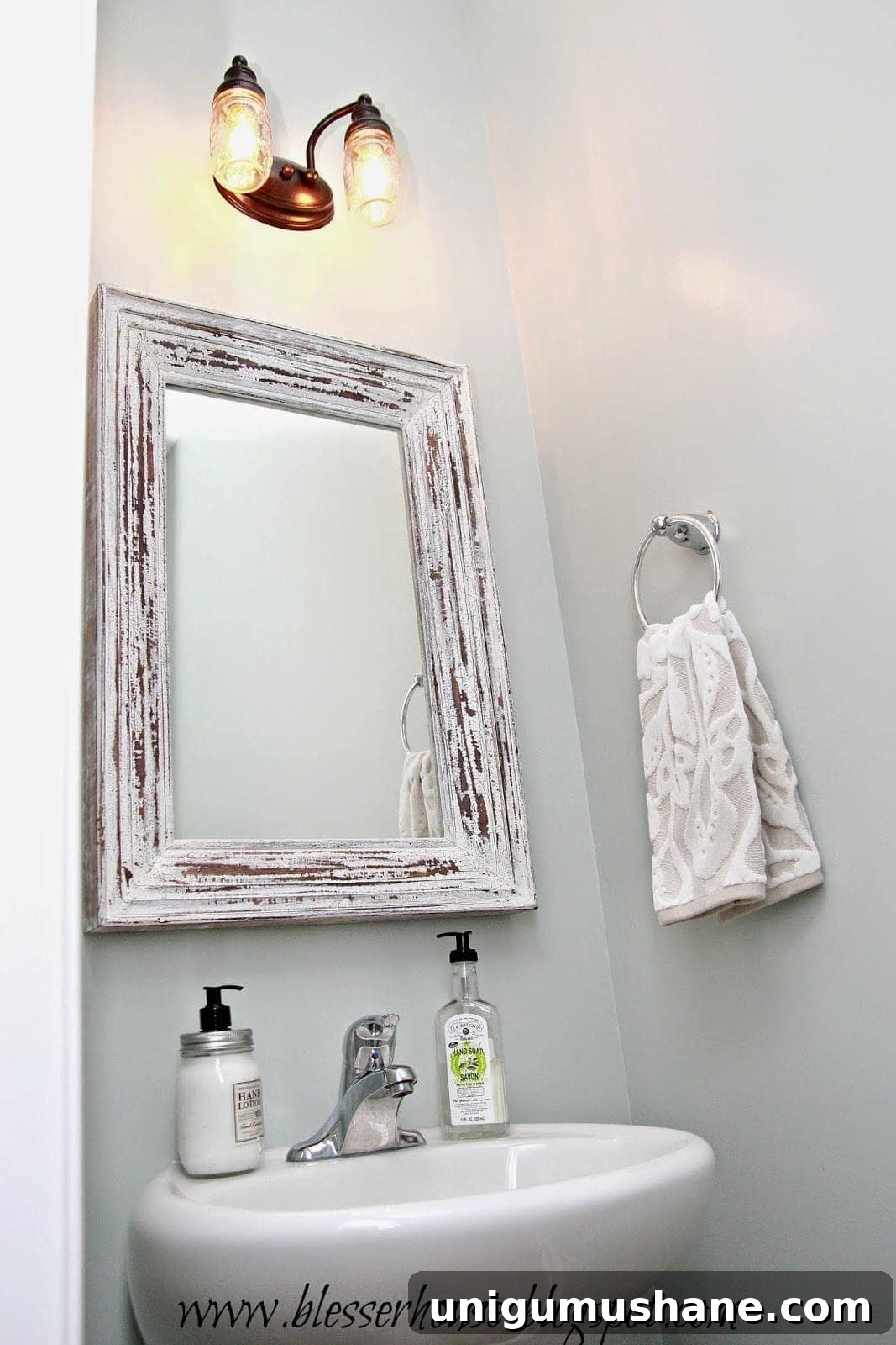 DIY Mason Jar Vanity Light for Rustic Bathroom Lighting 13 Final look of the mason jar vanity light with mirror