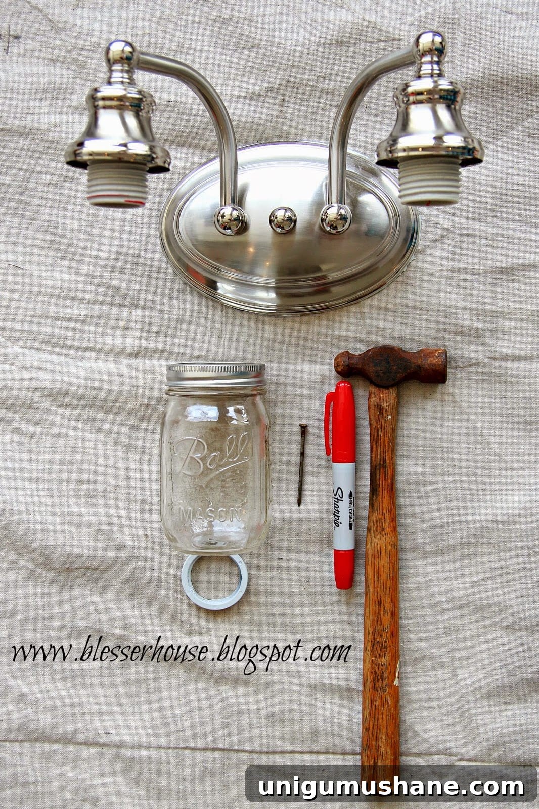 DIY Mason Jar Vanity Light for Rustic Bathroom Lighting 3 Fixture disassembled and spray painted