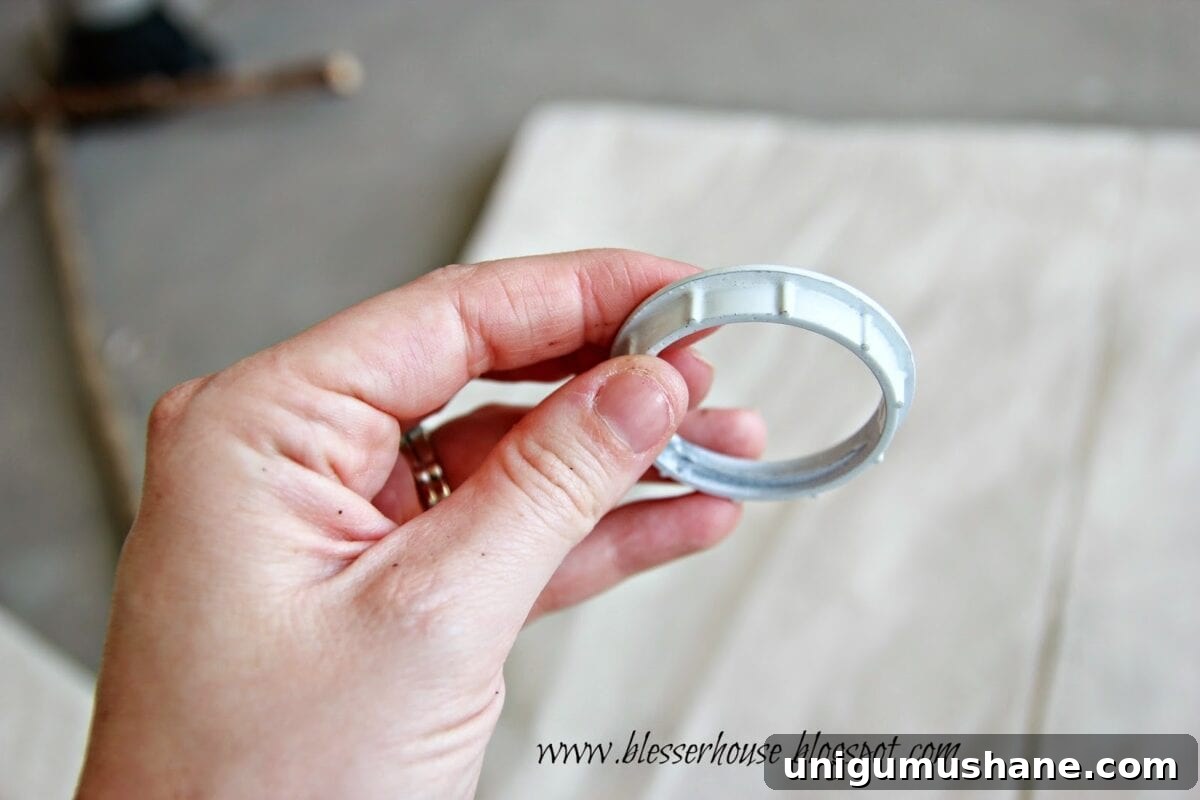 DIY Mason Jar Vanity Light for Rustic Bathroom Lighting 5 Tracing flange onto mason jar lid